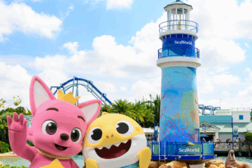 Baby Shark SeaWorld Orlando image with the signature lighthouse in background