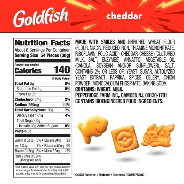 Front of Goldfish Pokemon Cheddar crackers package showing Nutrition Facts panel (140 calories per serving, 5g fat, 20g carbs) and three orange fish-shaped crackers on a white background.