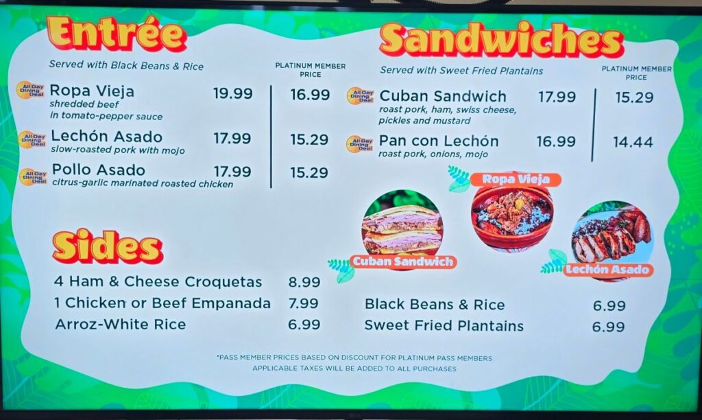 Menu board showing Entrees and Sides with prices; examples include Ropa Vieja, Lechón Asado, Pollo Asado, Cuban Sandwich, Pan con Lechón, and various sides like Arroz-White Rice and Black Beans & Rice.