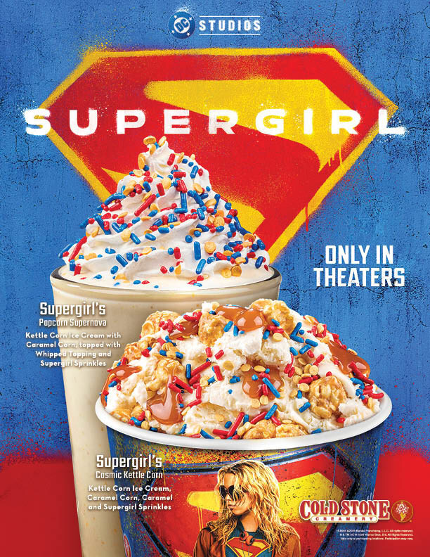 Promotional Cold Stone Supergirl treats poster for 'Supergirl' with a blue background, large shield logo, and two dessert cups topped with sprinkles; 'Only in theaters' text visible.