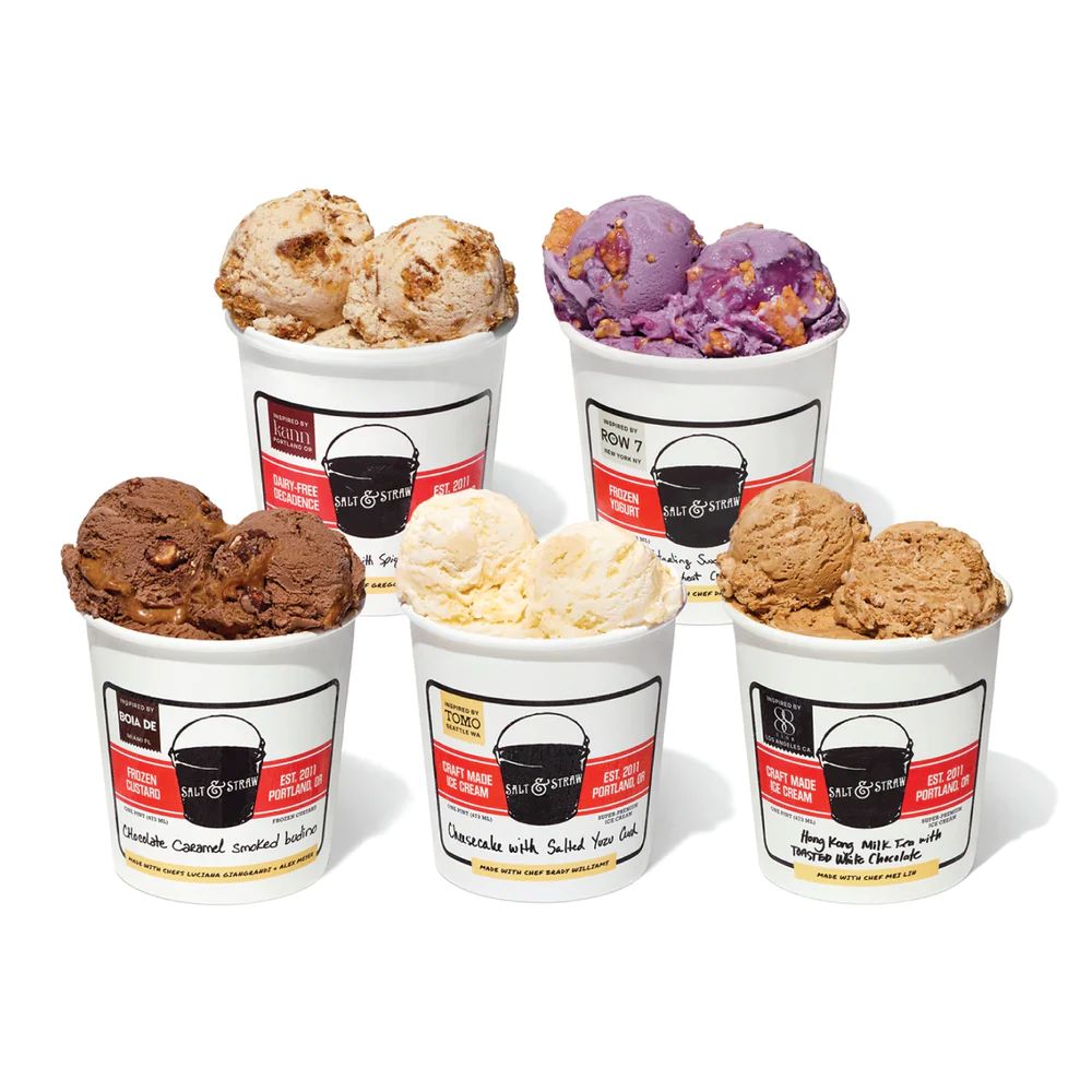 Five cups of assorted Salt & Straw June 2026 ice cream flavors in white takeaway containers with red-and-black labels, arranged in two rows on a white background.