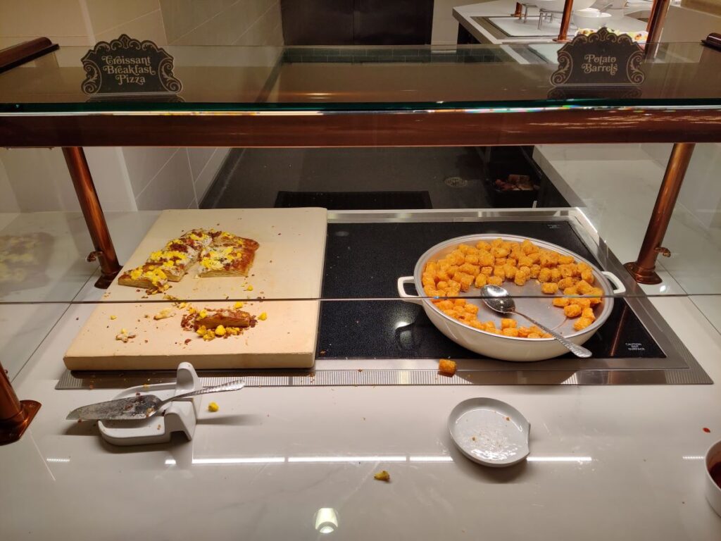 1900 Park Fare Breakfast: Croissant Breakfast Pizza and Tater Tots