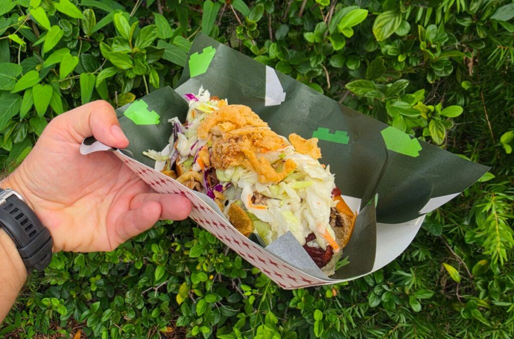 Legoland Florida World Cup BBQ Dog shown against a green background
