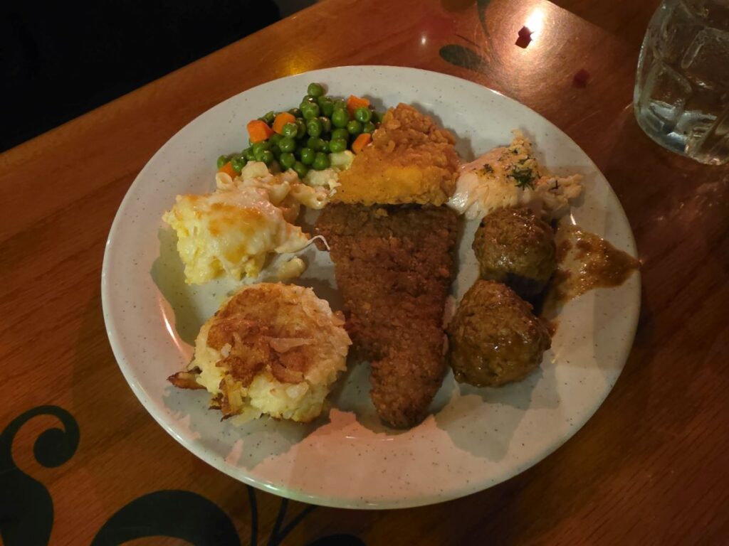 Biergarten Epcot review- plate shown with various German food