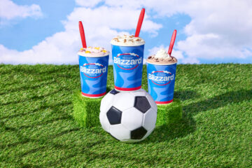 DQ Summer Treats - image of three different blizzards resting on grass and near a soccer ball