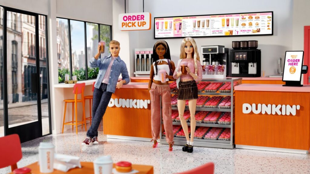 Dunkin Barbie Menu promotional photo showing Ken and Barbie at Dunkin'