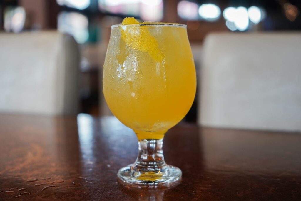 Liquid Gold NBA Finals Watch Party promotional photo showing a cocktail