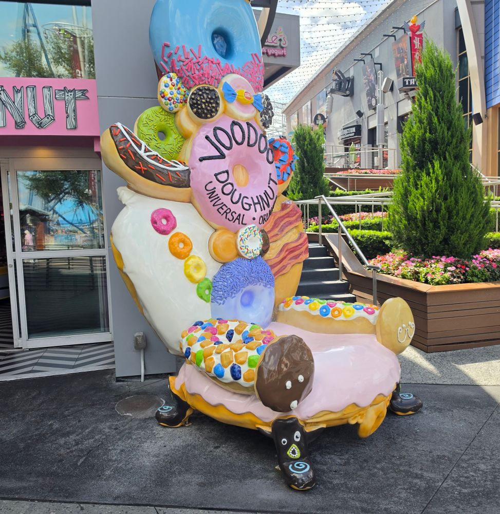 Voodoo Doughnut chair in front of store