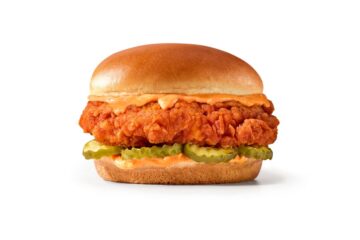7_Eleven_Spicy_Chicken_Sandwich shown with a shiny bun with battered chicken in between.