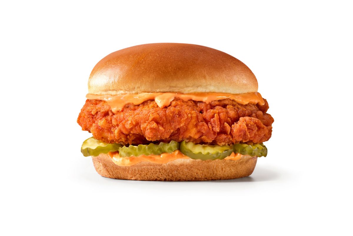 7_Eleven_Spicy_Chicken_Sandwich shown with a shiny bun with battered chicken in between.