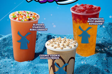 Promotional graphic for Dutch Bros featuring three seasonal drinks resting in blue sand against a blue sky. Text reads "TAKE ME TO PLANET DUTCH" with a star logo. The featured drinks are the Blended Stardust Rebel Energy, Cosmic Cookie Dough Freeze, and Supernova Myst Energy Refresher.