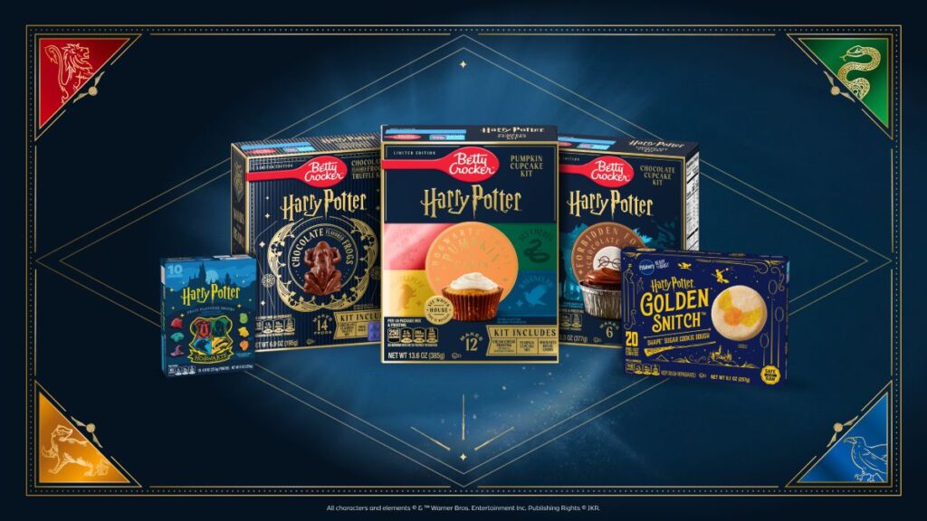 Five Harry Potter treats Betty Crocker baking kits, including cupcakes and cookies, are displayed on a blue background with Hogwarts house crests in the corners by General Mills