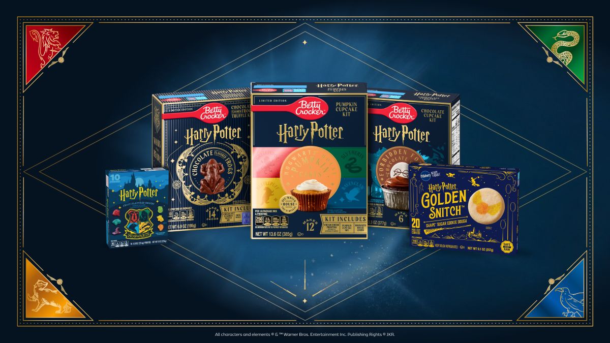Five Harry Potter treats Betty Crocker baking kits, including cupcakes and cookies, are displayed on a blue background with Hogwarts house crests in the corners by General Mills