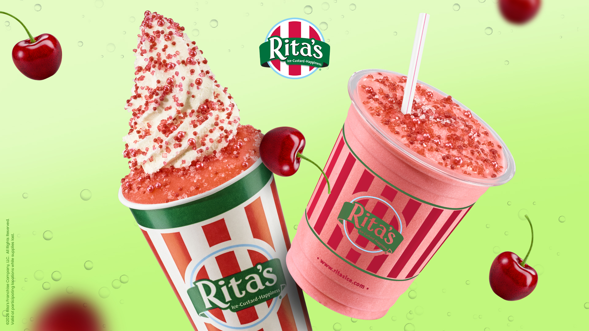 Rita's red Shirley Temple Italian ice topped with vanilla custard and a pink blended drink surrounded by floating fresh red cherries and green bubbles.