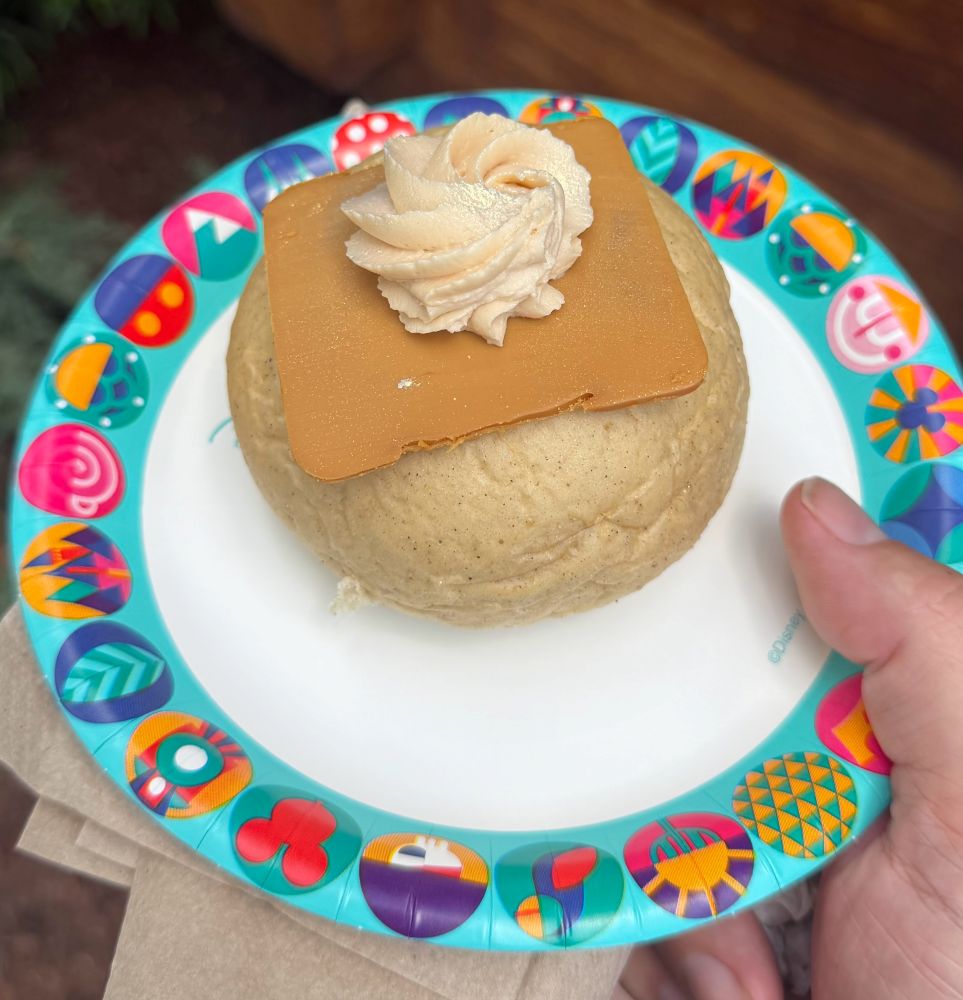 Caramel Cream Gjetost Bolle shown on a paper plate
