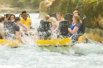 Congo River Rapids official photo showing guests riding a raft ride