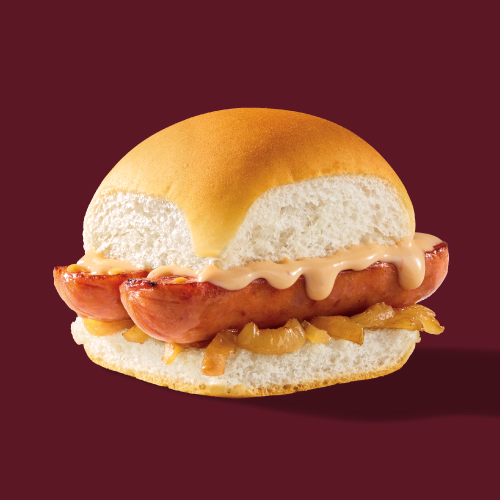 Close-up of a White Castle beer cheese slider featuring split smoked sausage, caramelized onions, and dripping Garage Beer cheese sauce.