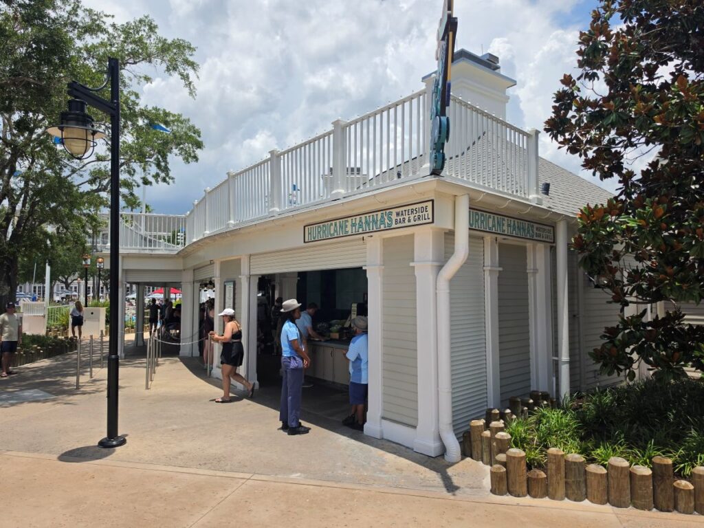 Order counter and exterior of Hurricane Hanna's Waterside Bar & Grill at Disney's Yacht & Beach Club Resorts