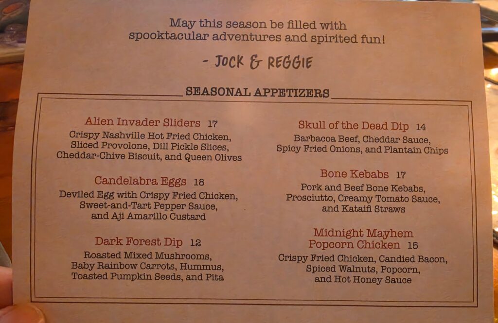 Printed menu for Jock Lindsey's Hangar Bar displaying seasonal appetizers, descriptions, and prices for Halloween items.