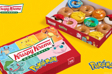 A dozen Krispy Kreme Pokémon doughnuts in a branded red box, featuring various colorful glazed doughnuts topped with character decorations.