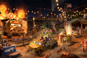 Artist concept artwork for Miss Fritter's Daredevil Spin-Along at Piston Peak showing guests riding colorful Cars-themed vehicles past a giant school bus stage surrounded by flames, string lights, and racing decorations.
