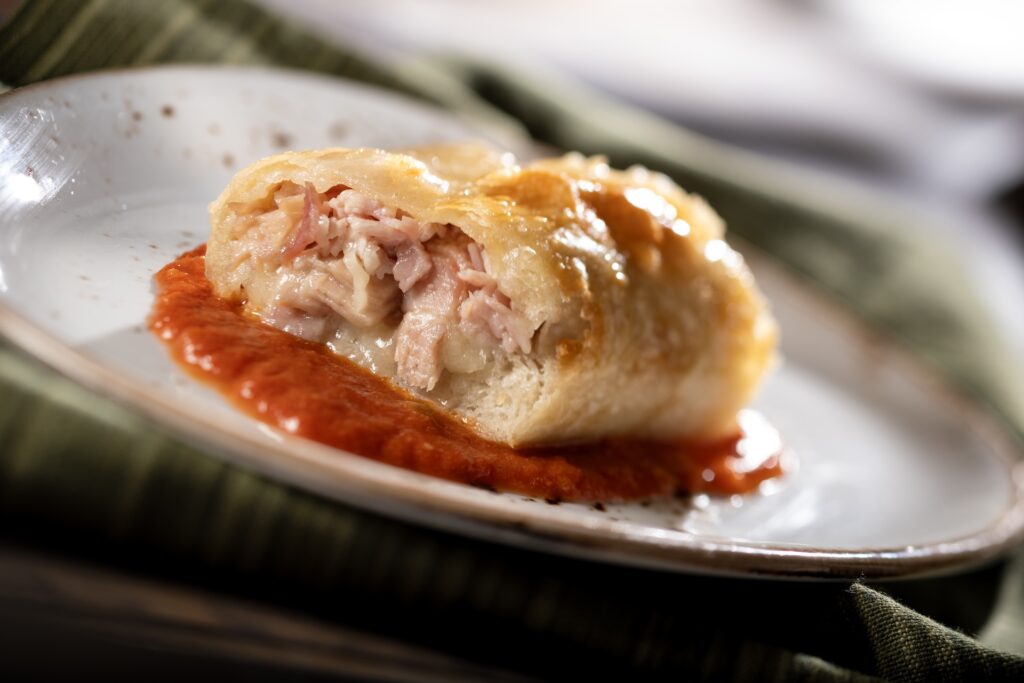 Official Walt Disney Food & Wine Festival promotional photo for Stromboli for Epcot Italy menu 2026.