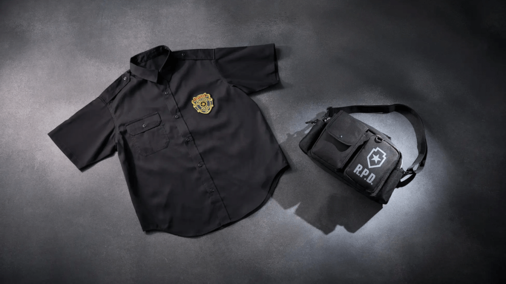 A black short-sleeved police shirt with a Raccoon Police badge and a matching black shoulder bag featuring an R.P.D. logo on a dark gray background.