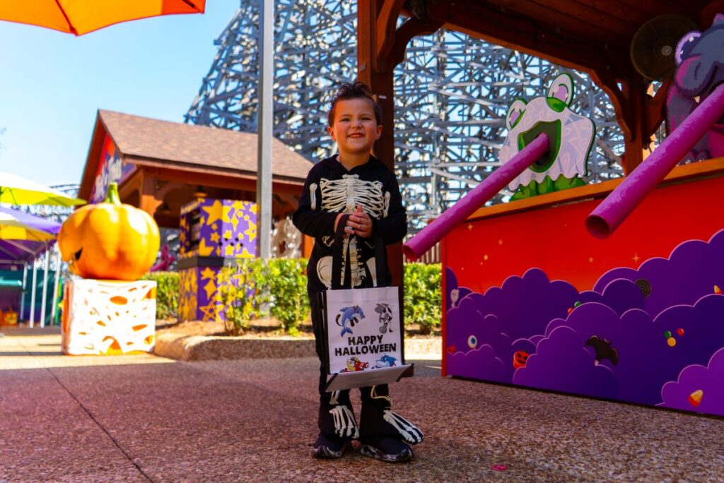 Child in front of candy stop during Busch Gardens Halloween Spooktacular