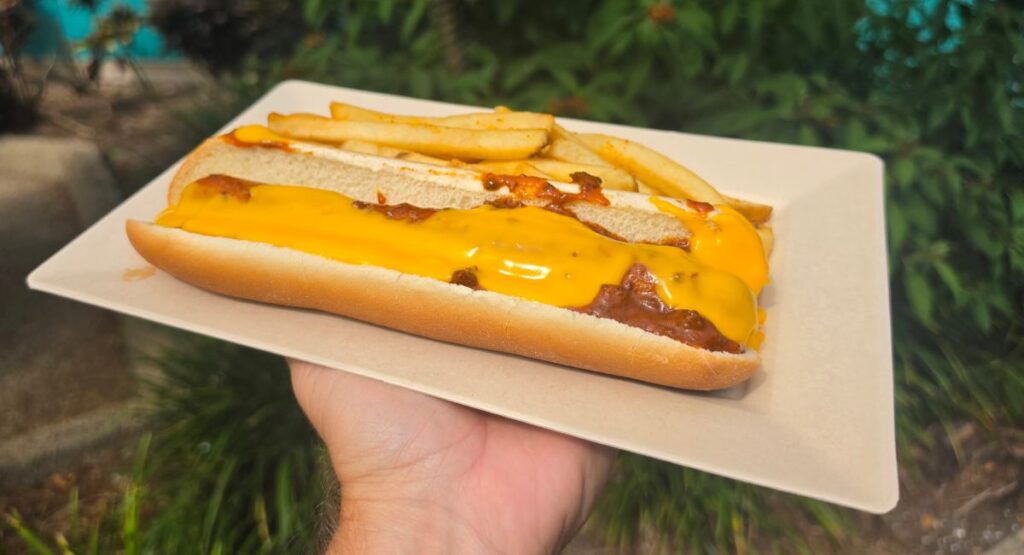 Foot-long hot dog with chili and cheese shown up close at Captain Pete's Hot Dogs