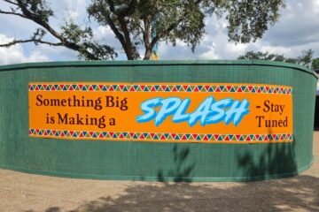 Construction walls and signage around Project Driftwood at Busch Gardens Tampa Bay