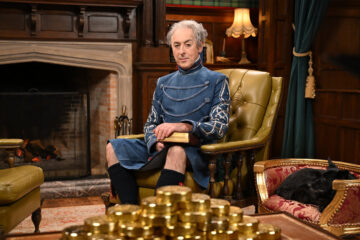 The Traitors New Blood promotioanl image showing Alan Cummings seated in a chair