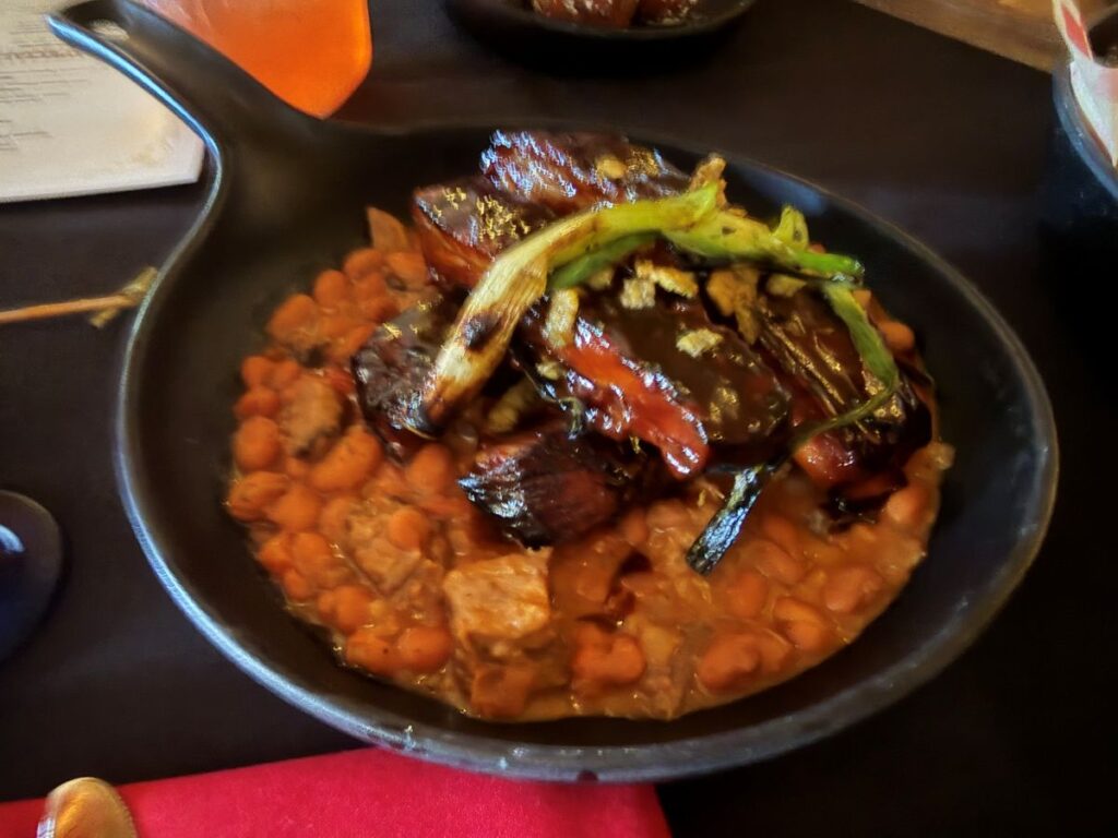 Glazed Sticky Ribe over Cowboy Beans