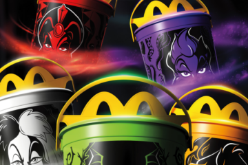 Five colorful McDonald's Happy Meal Boo Buckets featuring Disney villains Jafar, Ursula, Cruella de Vil, Maleficent, and Scar on a dark background.