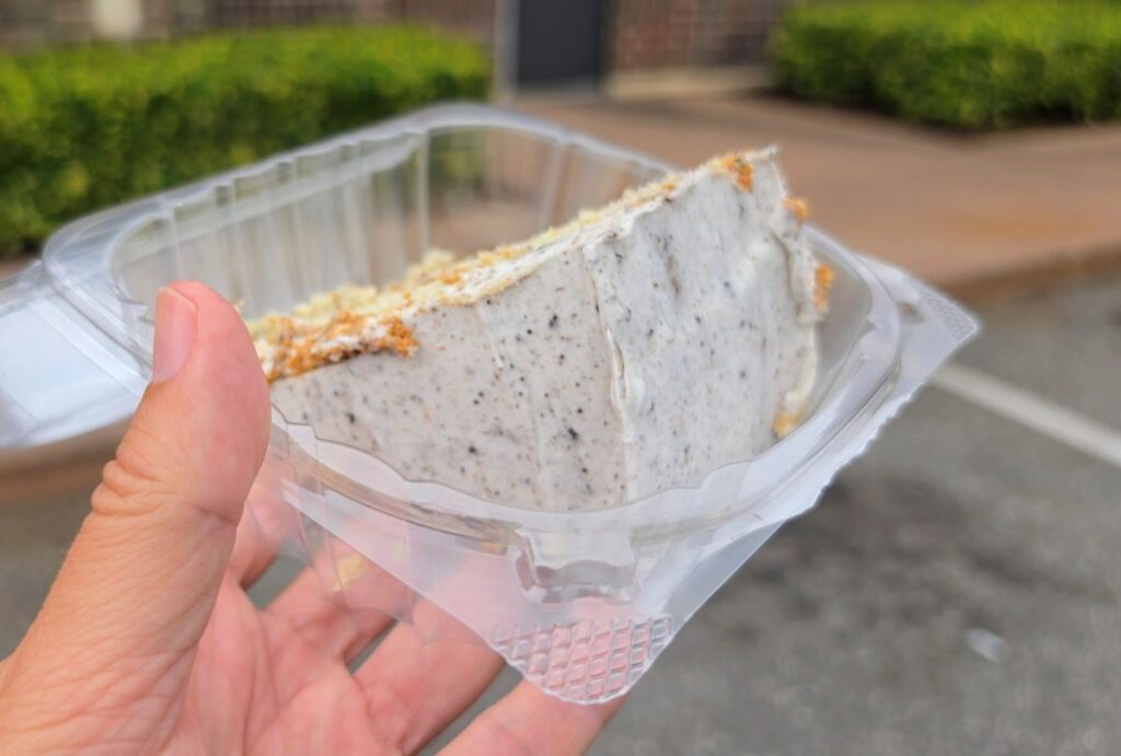 Portillo's Oreo Cake slice shown in an opened plastic container